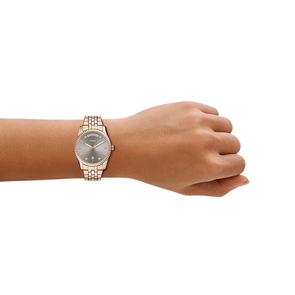 Fossil Women’s Scarlette Three-Hand Day-Date Rose Gold-Tone Stainless Steel Watch