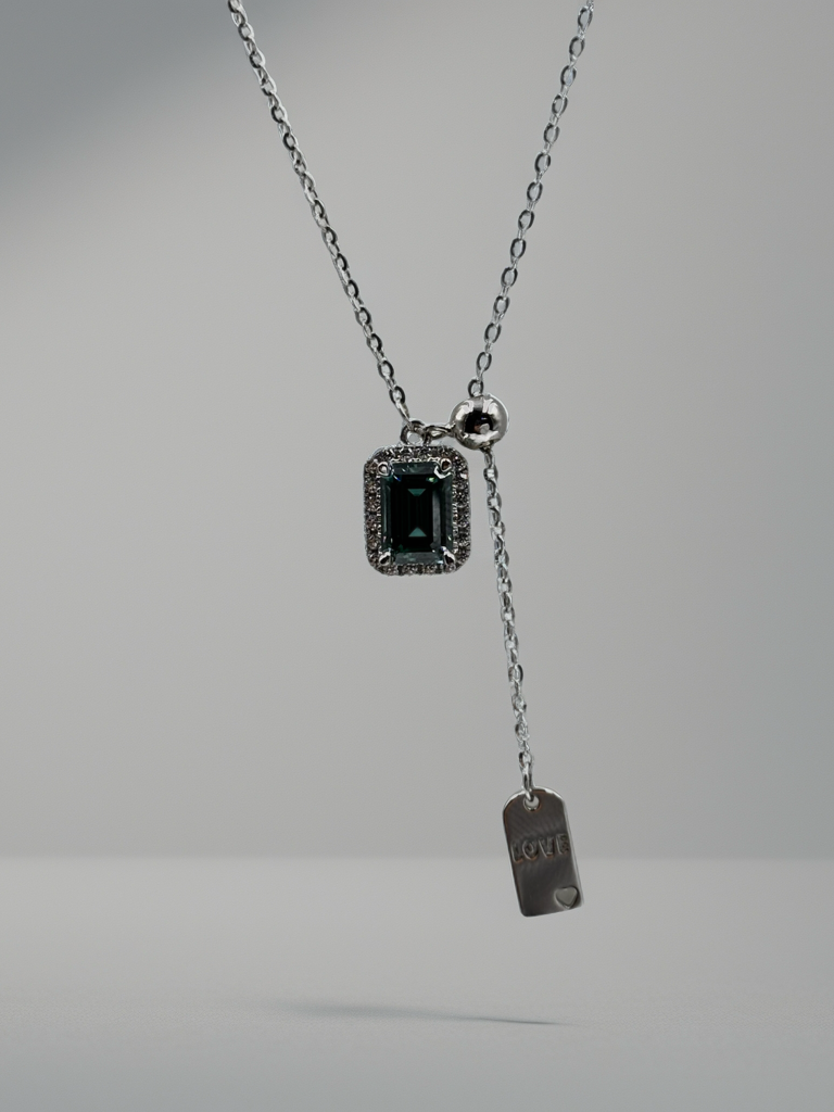 Sterling Silver Necklace with a Green Emerald Cut Moissanite Centred Stone